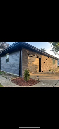 a house with a garage and a driveway