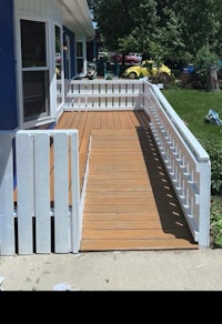 a wooden deck with a ramp on it