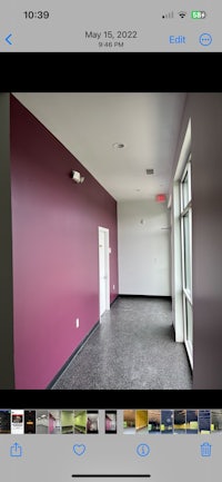 a photo of a room with purple walls