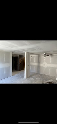 a room that is being remodeled with white walls