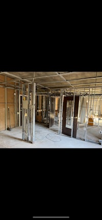 a room that is under construction with steel beams